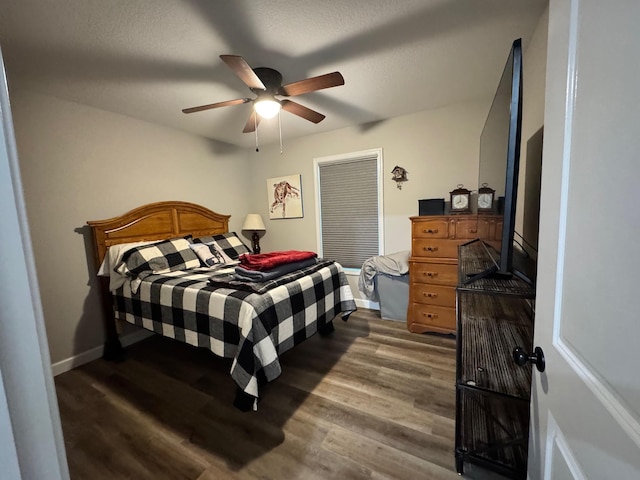 111 Stellar Ct, Clarkrange, TN 38553 - bedroom featuring dark wood-type flooring, baseboards, and a ceiling fan