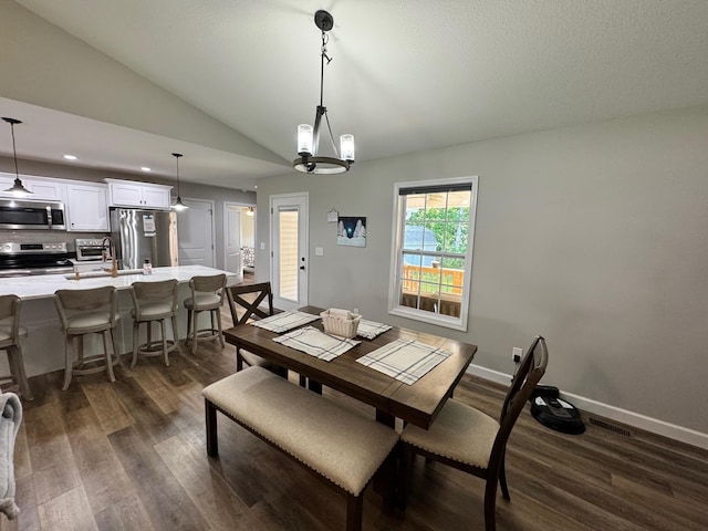111 Stellar Ct, Clarkrange, TN 38553 - dining space with dark wood finished floors, vaulted ceiling, baseboards, recessed lighting, and a chandelier