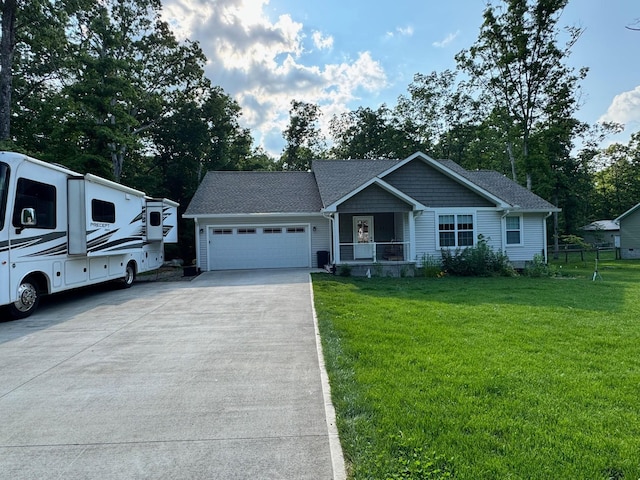 111 Stellar Ct, Clarkrange, TN 38553 - view of front of property featuring driveway, a front yard, and an attached garage