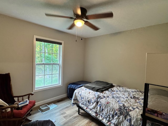 111 Stellar Ct, Clarkrange, TN 38553 - bedroom featuring light wood-type flooring, baseboards, and a ceiling fan