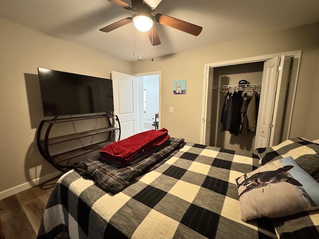 111 Stellar Ct, Clarkrange, TN 38553 - bedroom with baseboards, wood finished floors, a closet, and a ceiling fan