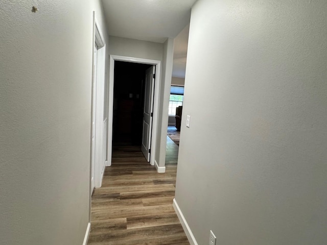 111 Stellar Ct, Clarkrange, TN 38553 - hallway with baseboards and wood finished floors