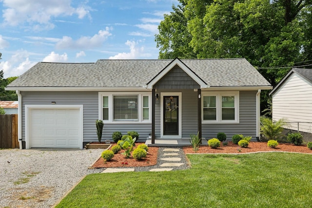 807 Brown St, Columbia, TN 38401 - view of front facade featuring roof with shingles, an attached garage, driveway, and covered porch