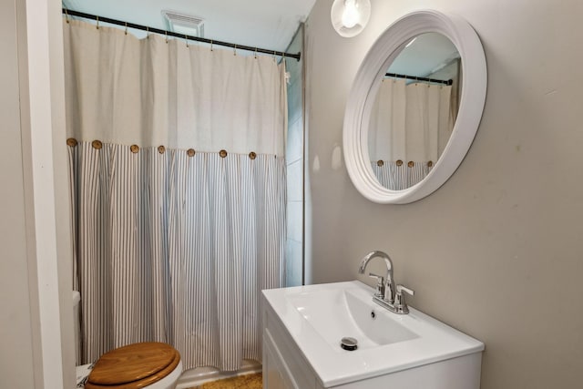 807 Brown St, Columbia, TN 38401 - bathroom with toilet, vanity, and a shower with curtain