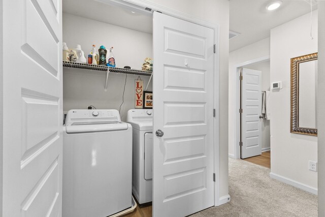 2563 Drumwright Way, Columbia, TN 38401 - laundry room featuring washer and dryer, light carpet, and baseboards
