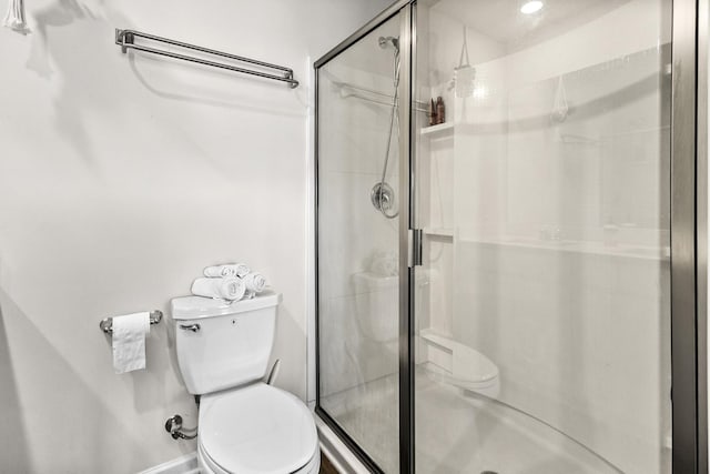 2563 Drumwright Way, Columbia, TN 38401 - bathroom with toilet, a stall shower, and baseboards