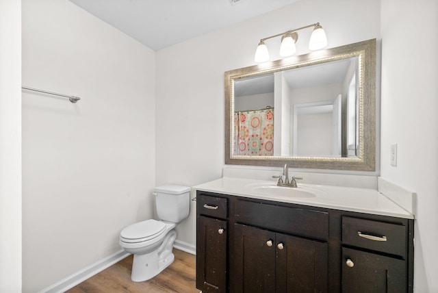 157 Bob White Trl, Oak Grove, KY 42262 - full bath featuring vanity, toilet, wood finished floors, and baseboards