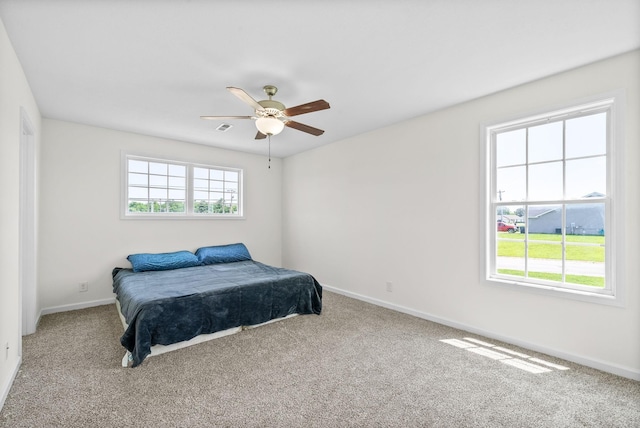 157 Bob White Trl, Oak Grove, KY 42262 - bedroom with baseboards, carpet floors, and ceiling fan