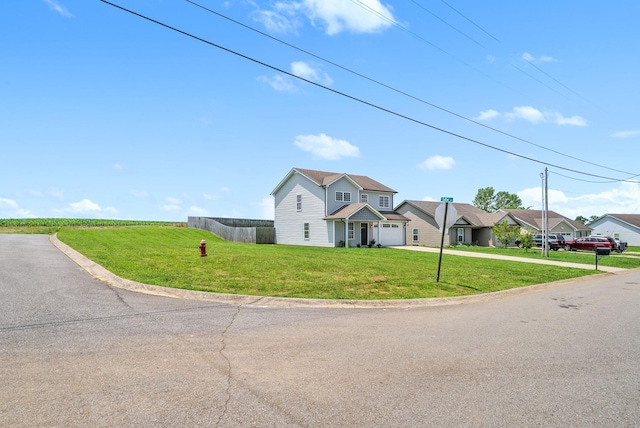 157 Bob White Trl, Oak Grove, KY 42262 - view of front of home with concrete driveway, a garage, and a front yard
