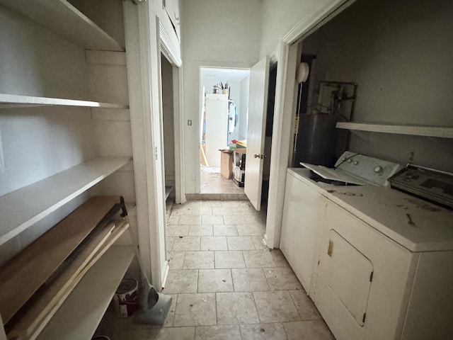 345 Lockert Pl, Clarksville, TN 37043 - laundry area with independent washer and dryer and water heater