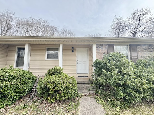 345 Lockert Pl, Clarksville, TN 37043 - view of exterior entry with brick siding and covered porch