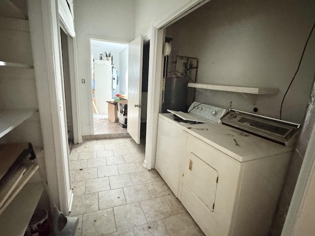 345 Lockert Pl, Clarksville, TN 37043 - washroom with washing machine and clothes dryer and gas water heater