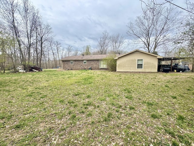 345 Lockert Pl, Clarksville, TN 37043 - view of green lawn with a carport