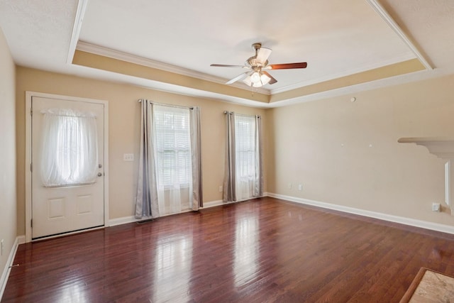 1056 Orion Jones Rd, Chapmansboro, TN 37035 - foyer featuring a tray ceiling, ceiling fan, ornamental molding, and wood finished floors