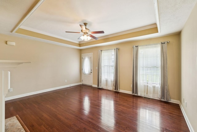 1056 Orion Jones Rd, Chapmansboro, TN 37035 - empty room with a tray ceiling, a ceiling fan, wood finished floors, and crown molding