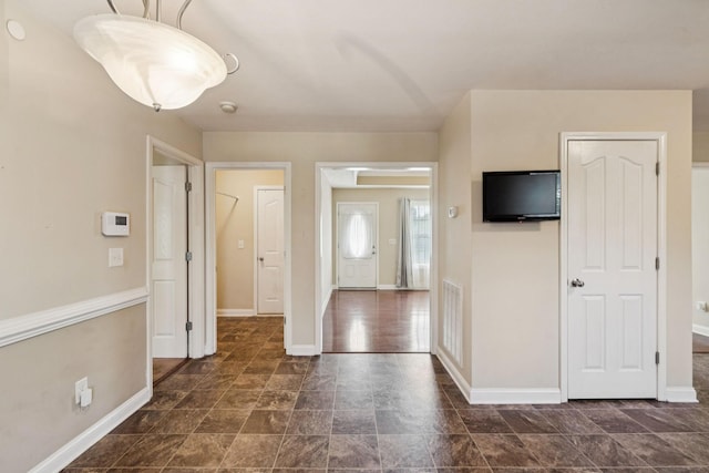 1056 Orion Jones Rd, Chapmansboro, TN 37035 - foyer featuring baseboards and stone finish flooring