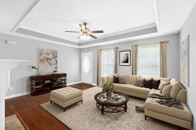 1056 Orion Jones Rd, Chapmansboro, TN 37035 - living room with a tray ceiling, ceiling fan, wood finished floors, and crown molding
