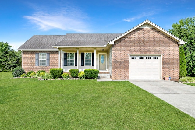 1056 Orion Jones Rd, Chapmansboro, TN 37035 - ranch-style house featuring brick siding, an attached garage, driveway, and a front yard