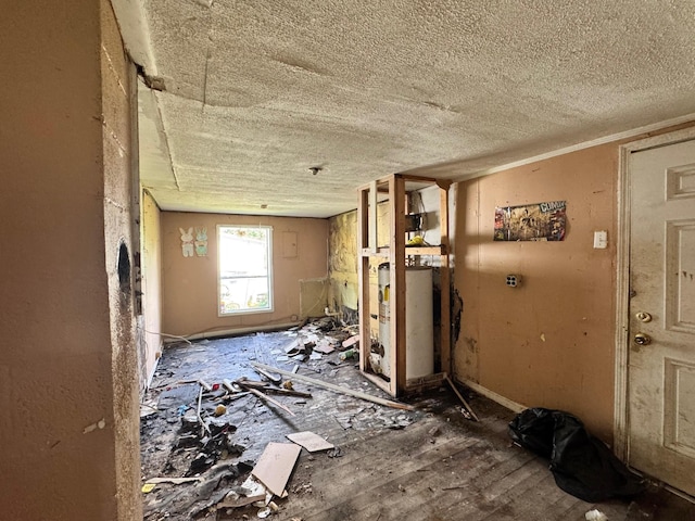 1070 W Rock Quarry Rd W, Clarkrange, TN 38553 - interior space featuring water heater and a textured ceiling