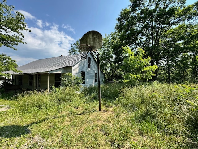 1070 W Rock Quarry Rd W, Clarkrange, TN 38553 - view of side of home with metal roof