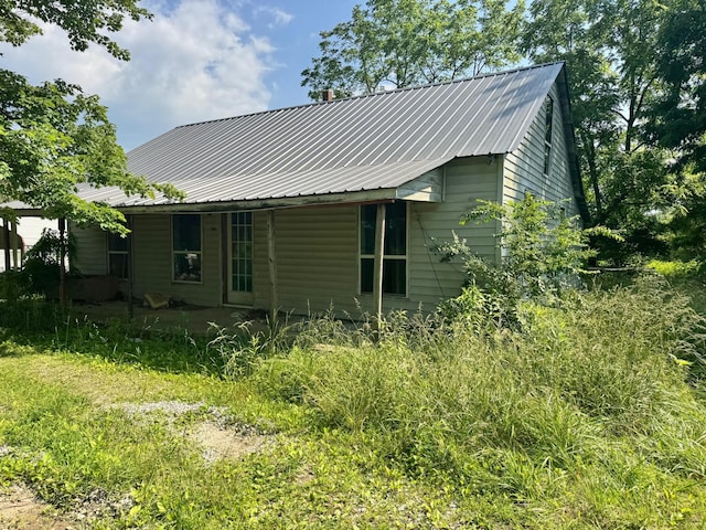 1070 W Rock Quarry Rd W, Clarkrange, TN 38553 - back of property with metal roof