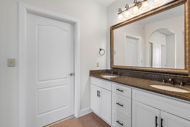 309 Seven Springs Way Unit 404, Brentwood, TN 37027 - bathroom with double vanity, tile patterned flooring, and baseboards