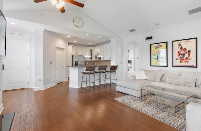 309 Seven Springs Way Unit 404, Brentwood, TN 37027 - living room featuring arched walkways, ceiling fan, dark wood-type flooring, recessed lighting, and high vaulted ceiling