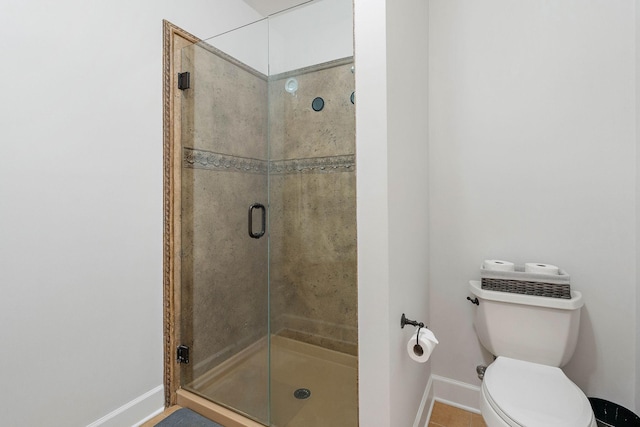 309 Seven Springs Way Unit 404, Brentwood, TN 37027 - full bath featuring baseboards, a stall shower, and toilet