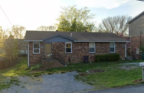 4643 Forest Ridge Dr, Hermitage, TN 37076 - back of property featuring brick siding