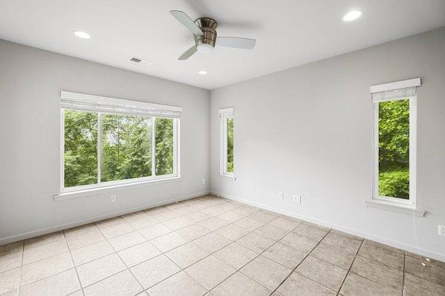 1853 Lafever Ridge Rd, Silver Point, TN 38582 - spare room with healthy amount of natural light, ceiling fan, baseboards, and recessed lighting