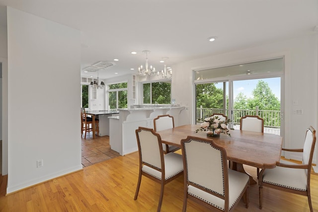 1853 Lafever Ridge Rd, Silver Point, TN 38582 - dining room featuring a chandelier, light wood finished floors, recessed lighting, and baseboards