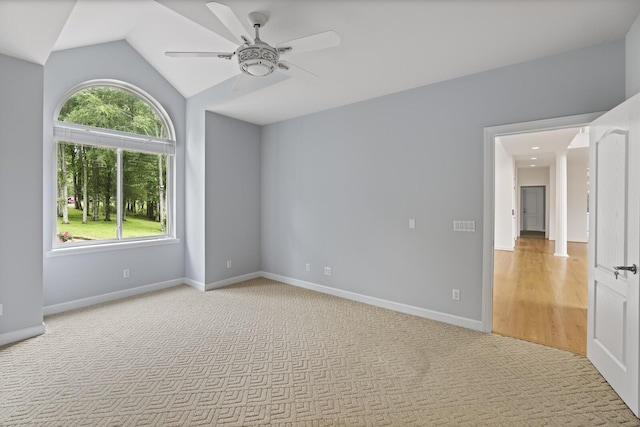 1853 Lafever Ridge Rd, Silver Point, TN 38582 - empty room featuring ceiling fan, vaulted ceiling, carpet floors, and baseboards