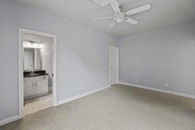 1853 Lafever Ridge Rd, Silver Point, TN 38582 - unfurnished bedroom featuring light colored carpet, a sink, ensuite bathroom, baseboards, and ceiling fan