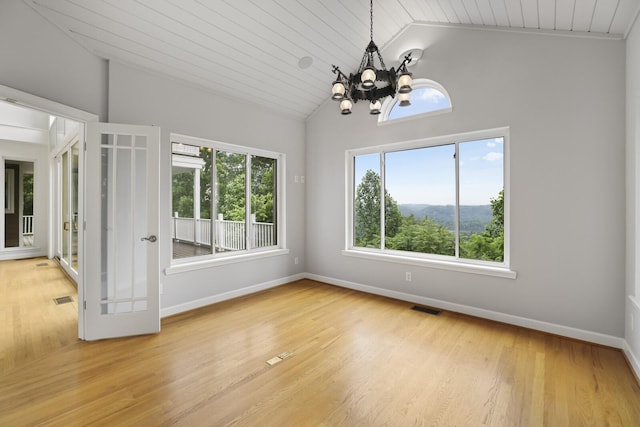 1853 Lafever Ridge Rd, Silver Point, TN 38582 - spare room featuring a chandelier, light wood-style flooring, baseboards, wooden ceiling, and high vaulted ceiling