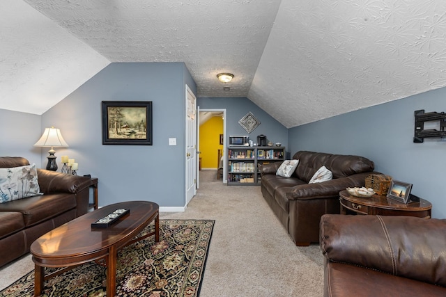 154 Jasons Way, Leoma, TN 38468 - living area with vaulted ceiling, light colored carpet, a textured ceiling, and baseboards