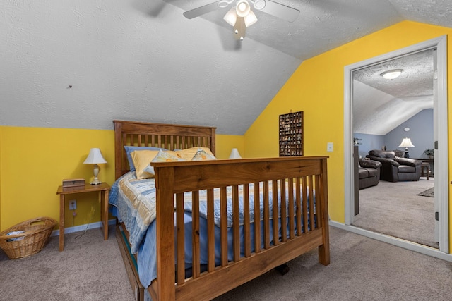154 Jasons Way, Leoma, TN 38468 - bedroom with a textured ceiling, carpet floors, vaulted ceiling, baseboards, and a ceiling fan
