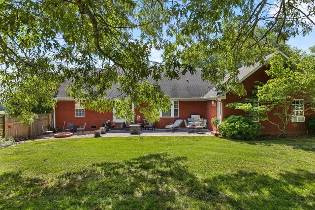 154 Jasons Way, Leoma, TN 38468 - rear view of property featuring an outdoor fire pit, brick siding, a patio area, roof with shingles, and entry steps