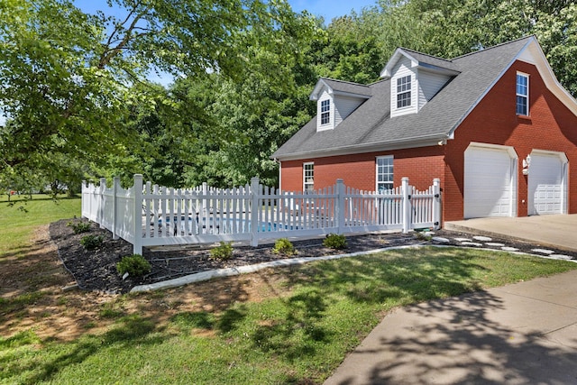 154 Jasons Way, Leoma, TN 38468 - view of front of house with brick siding, roof with shingles, and concrete driveway