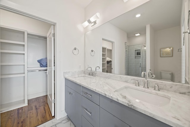 3746 Central Pike Unit 15, Hermitage, TN 37076 - full bathroom with a spacious closet, double vanity, a stall shower, toilet, and marble finish floors