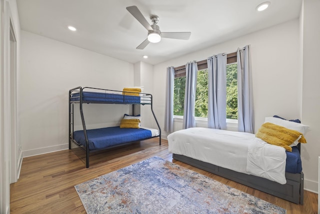 3746 Central Pike Unit 15, Hermitage, TN 37076 - bedroom with baseboards, wood finished floors, ceiling fan, and recessed lighting