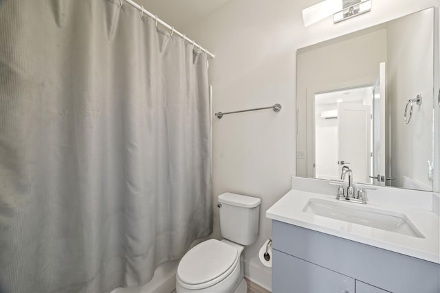 3746 Central Pike Unit 15, Hermitage, TN 37076 - full bathroom with vanity, toilet, a wall unit AC, and curtained shower
