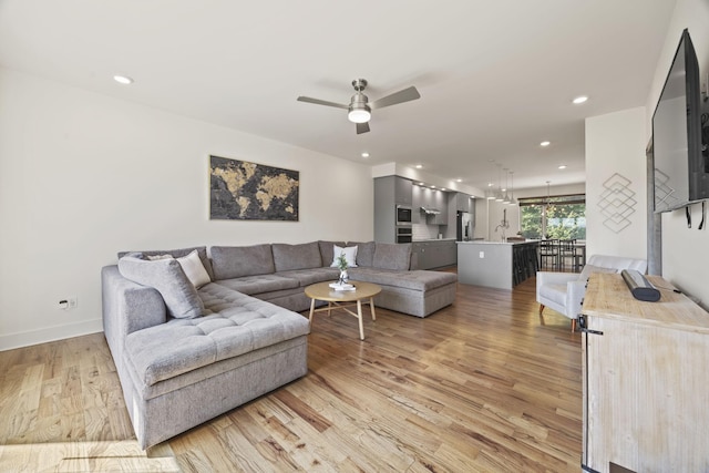 3746 Central Pike Unit 15, Hermitage, TN 37076 - living area featuring light wood-type flooring, a ceiling fan, recessed lighting, and baseboards