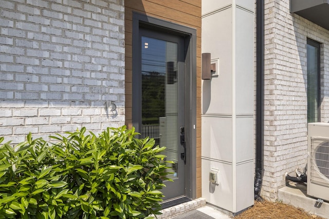 3746 Central Pike Unit 15, Hermitage, TN 37076 - property entrance featuring brick siding and ac unit