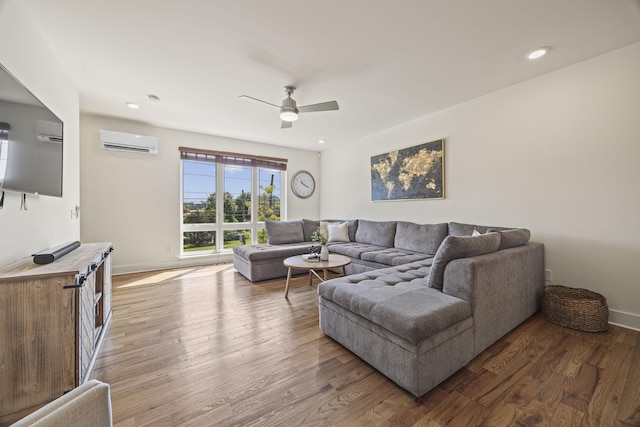 3746 Central Pike Unit 15, Hermitage, TN 37076 - living room featuring a wall mounted AC, ceiling fan, wood finished floors, baseboards, and recessed lighting