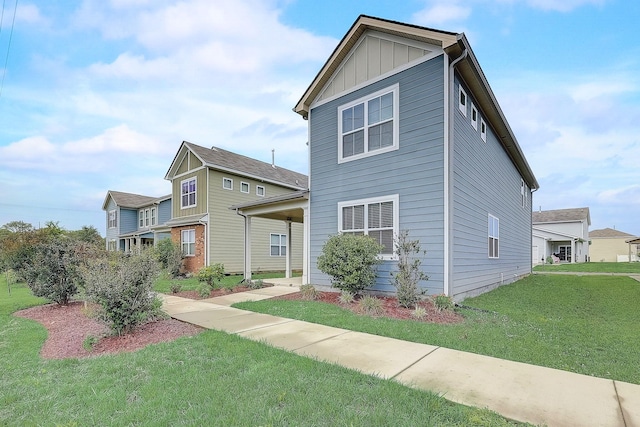 18 Pointer Pl, Lebanon, TN 37087 - view of front of house with a front lawn and board and batten siding