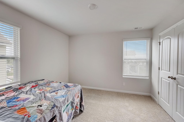 18 Pointer Pl, Lebanon, TN 37087 - bedroom with carpet flooring, multiple windows, and a closet