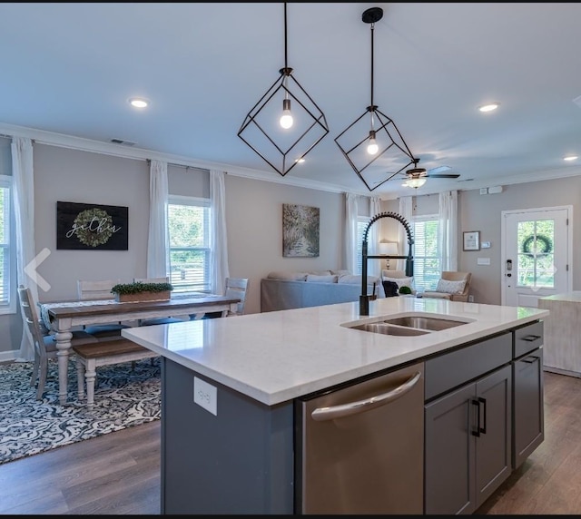 1727 Fenway Loop, Antioch, TN 37013 - kitchen featuring stainless steel dishwasher, a sink, open floor plan, ornamental molding, and dark wood-style flooring