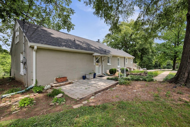 901 Edgewood Dr, Columbia, TN 38401 - rear view of property with a patio, a shingled roof, and brick siding