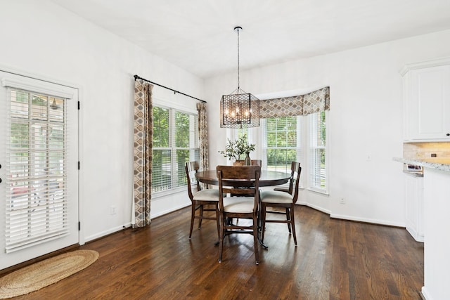 119 Abercairn Dr, Franklin, TN 37064 - dining room featuring a chandelier, dark wood-type flooring, and baseboards