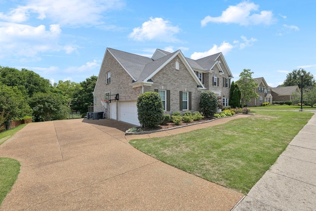 119 Abercairn Dr, Franklin, TN 37064 - view of front of property featuring a garage, driveway, and brick siding